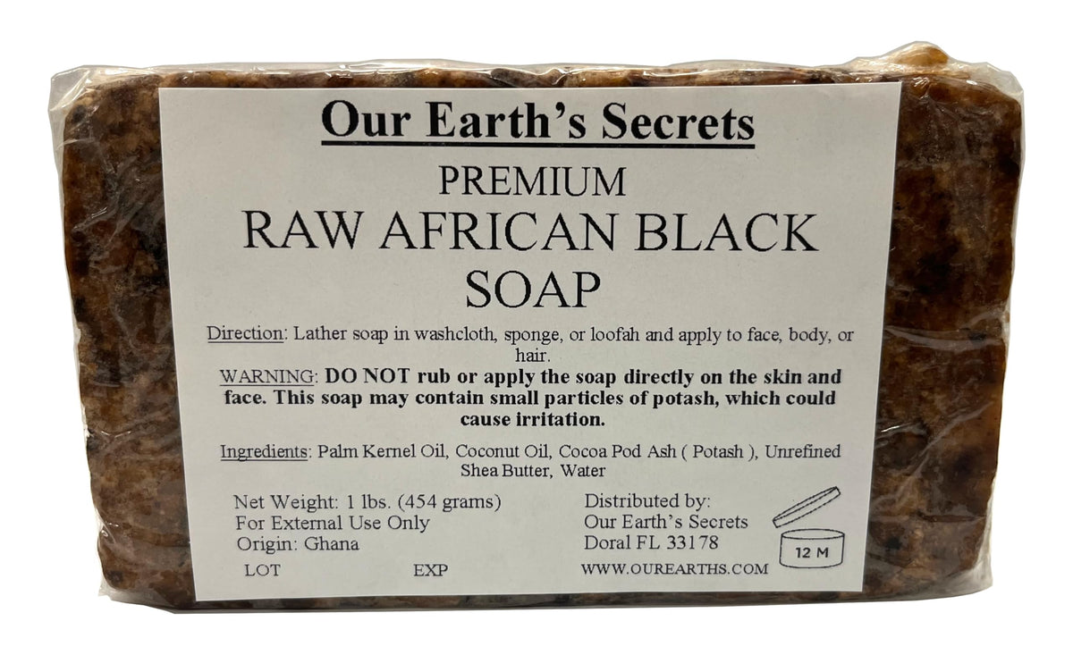 Our Earth's Secrets Raw African Black Soap bar front view for natural cleansing and gentle exfoliation.
