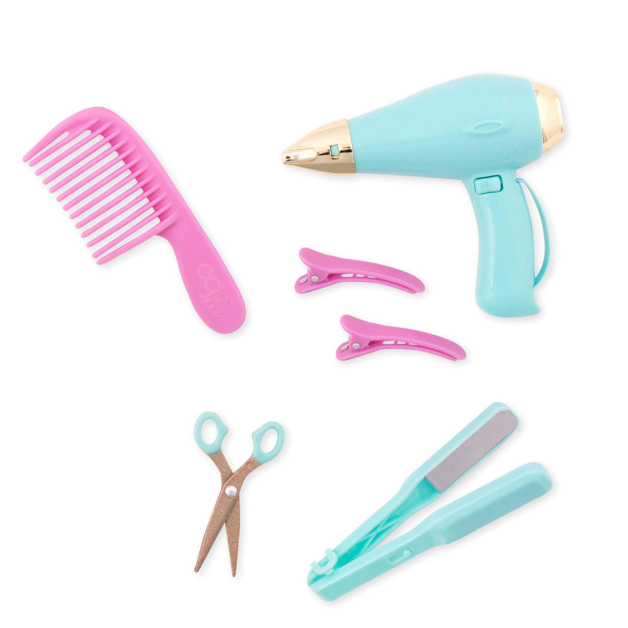 Our Generation pink cape enhances grooming role-play and imaginative makeovers.