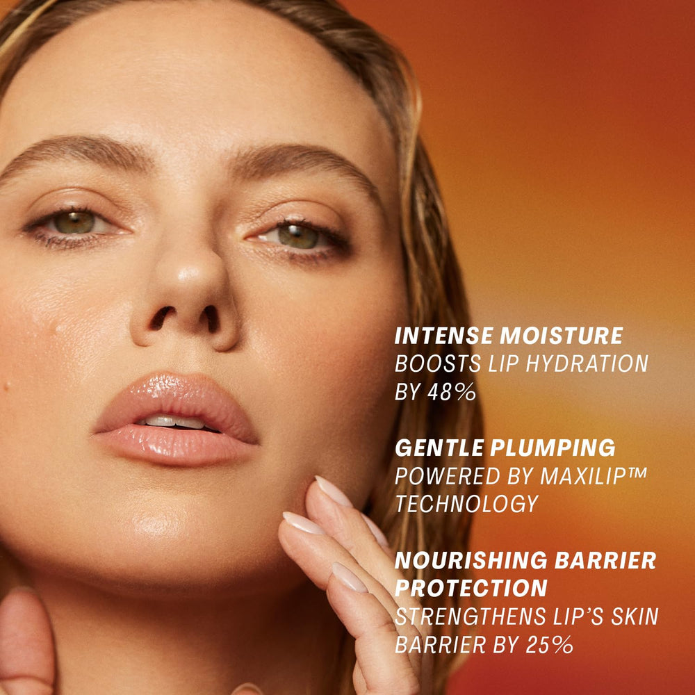 The Outset Lip Oasis Glossy Treatment hydration boost close-up highlights moisture on contact.