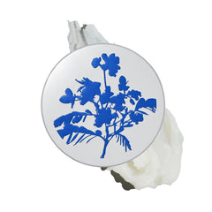The Outset botanical barrier rescue balm tin closeup showing portable hydration for dry skin.