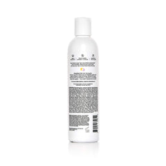 overtone Purple Toning Conditioner on sink shows compact 8 oz packaging for at-home color maintenance
