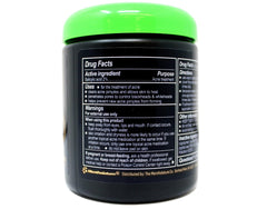 Oxy pad in hand demonstrating easy application and fast acne control