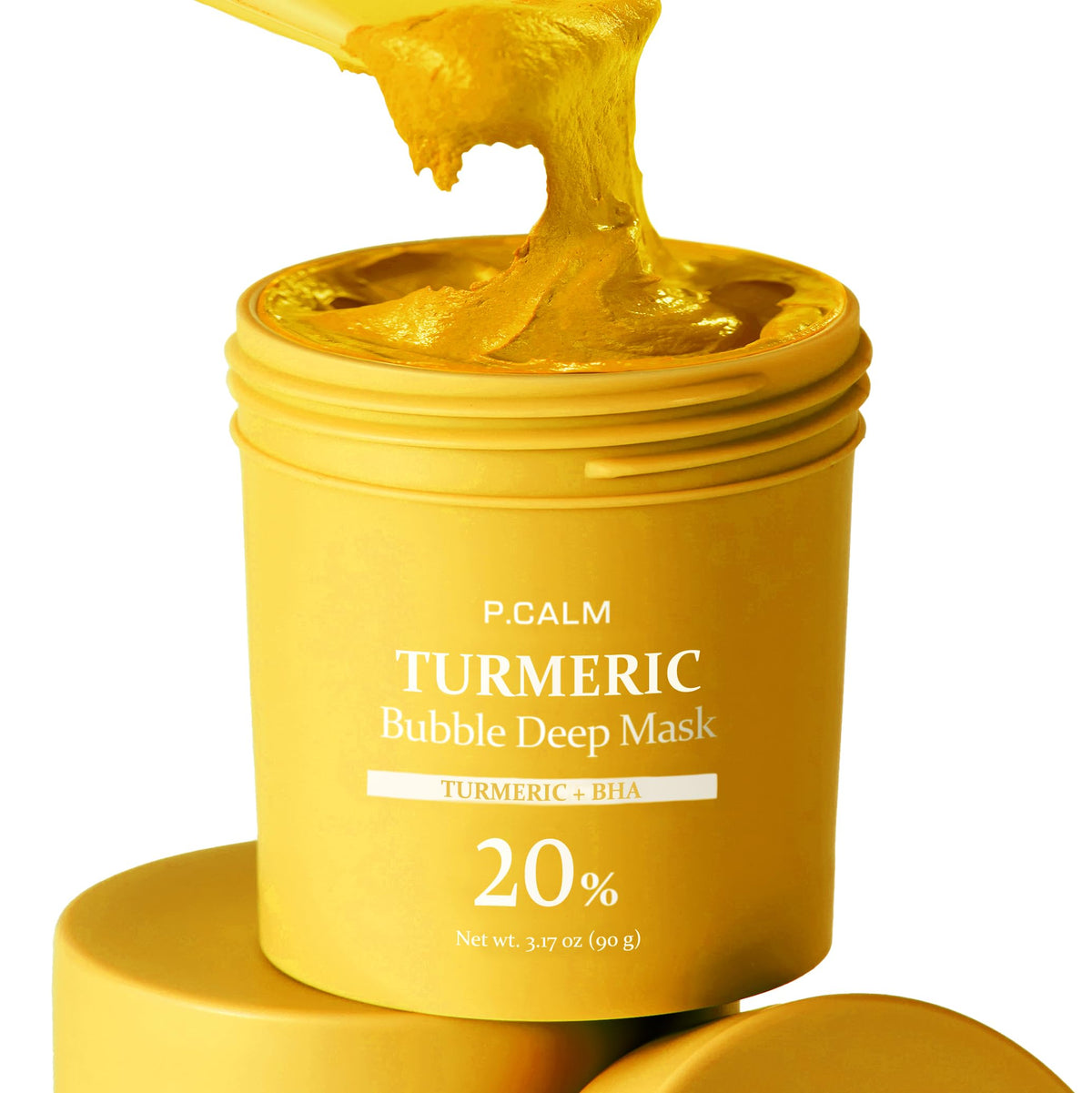 P.CALM Turmeric Bubble Deep Mask jar closeup shows creamy clay transforming into bubbles for a spa-like cleanse.