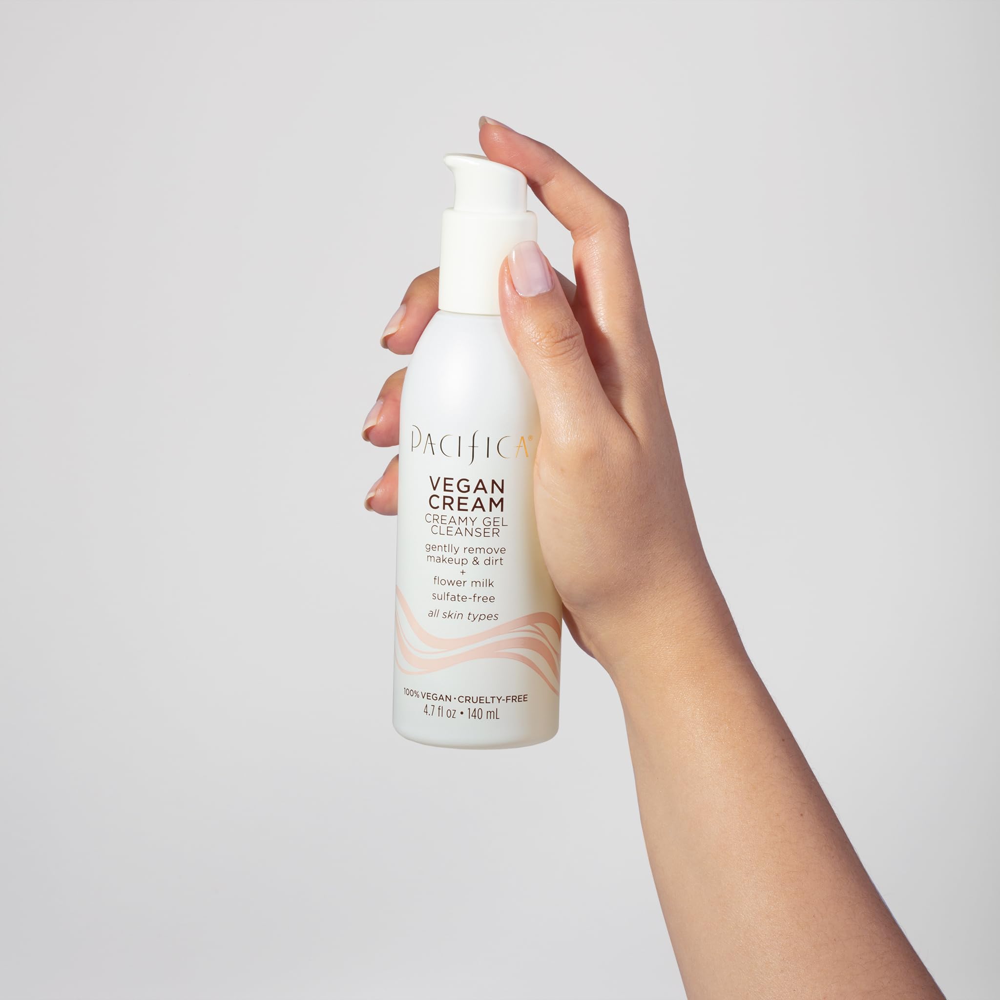 Pacifica Vegan Collagen Cleanser flower-milk extract close-up with calming botanicals.