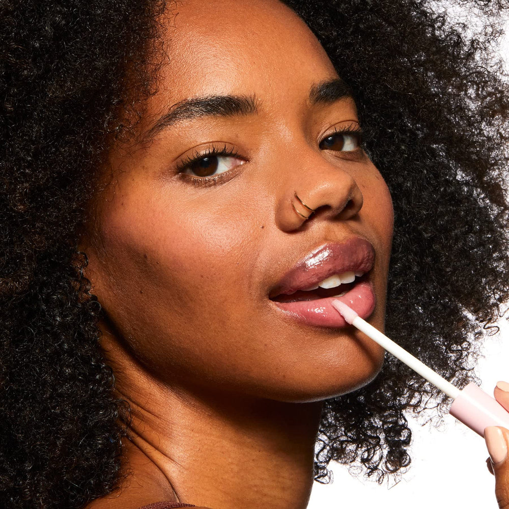 Pacifica Vegan Collagen Lip Plumping Gloss wet-gloss-on-lips shows high-shine non-sticky finish.