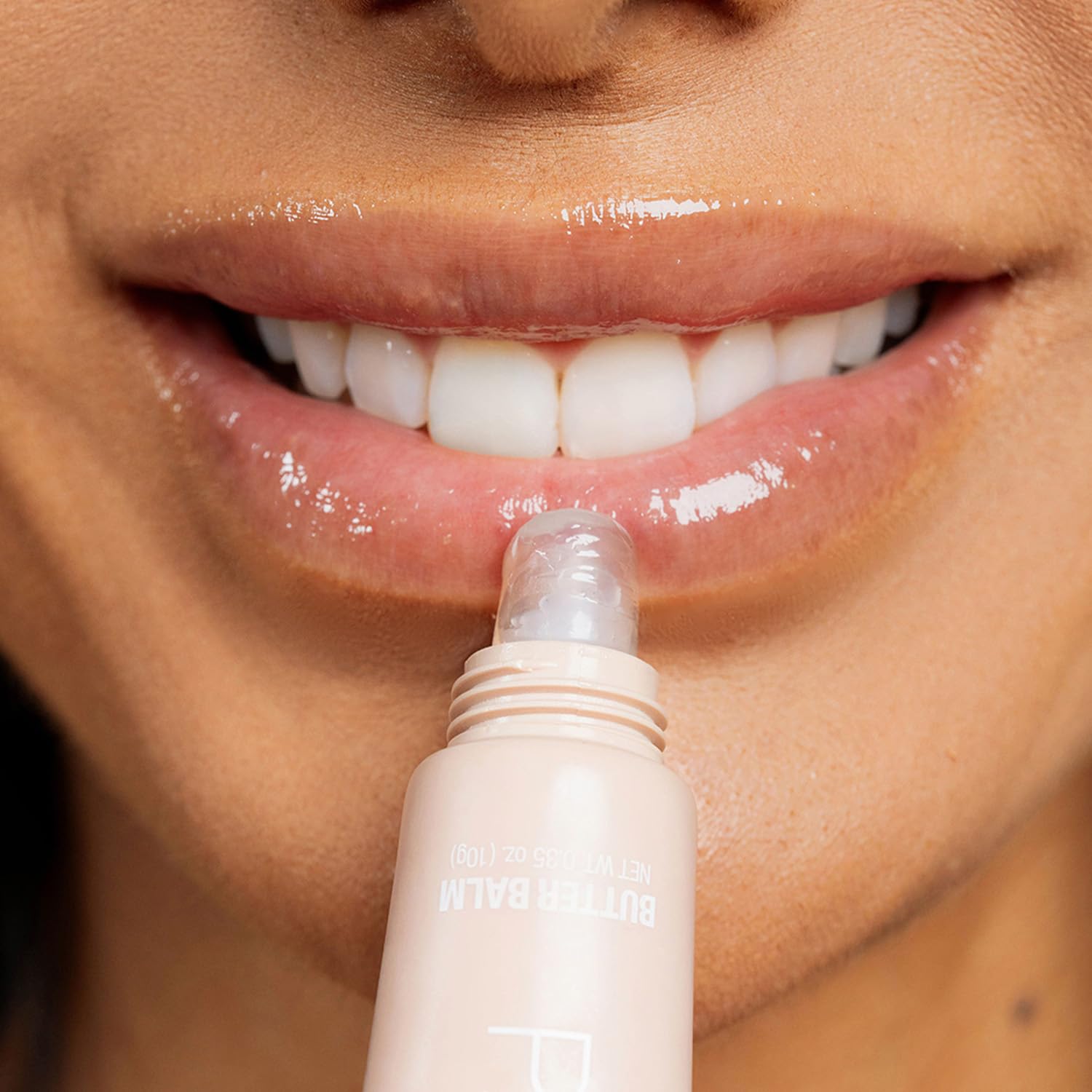 Palladio Butter Balm application demonstrates easy twist-up for quick lip touch-ups.