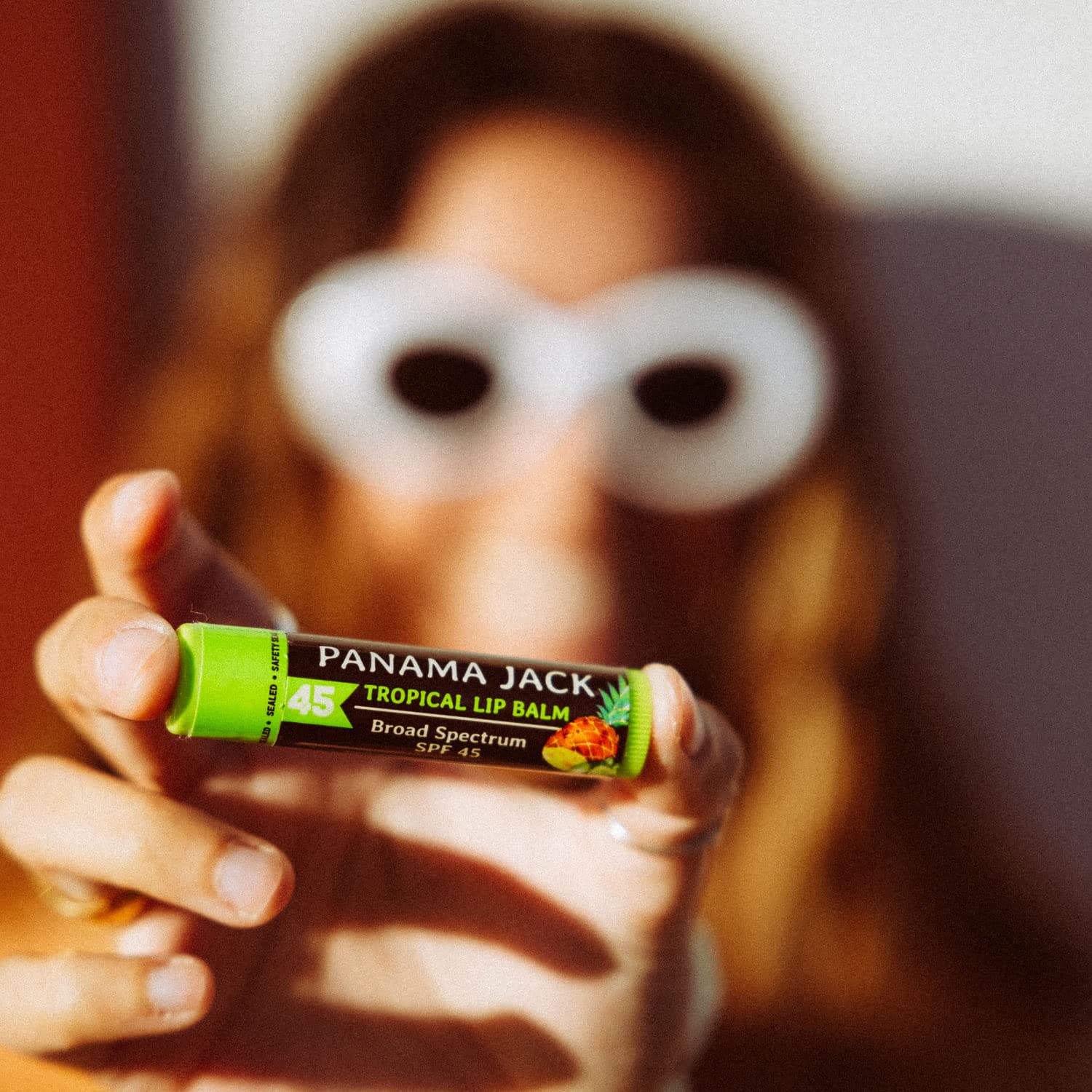 Panama Jack mango lip balm tube emphasizing smooth application.