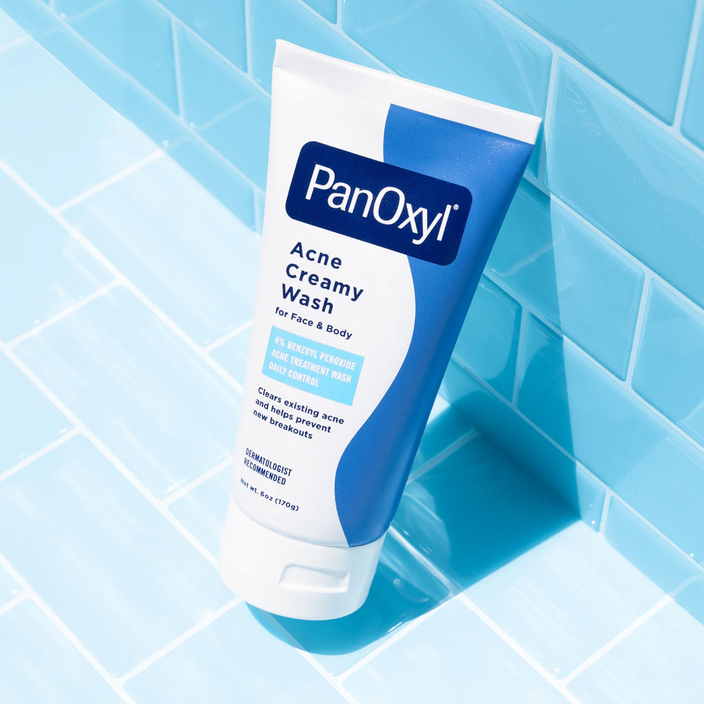 PanOxyl bottle with water droplets indicating a refreshing cleanse