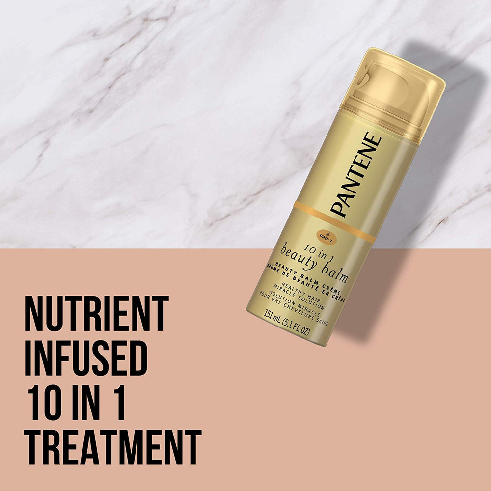 Pantene Beauty Balm in hand smoothing hair for soft texture and shine.