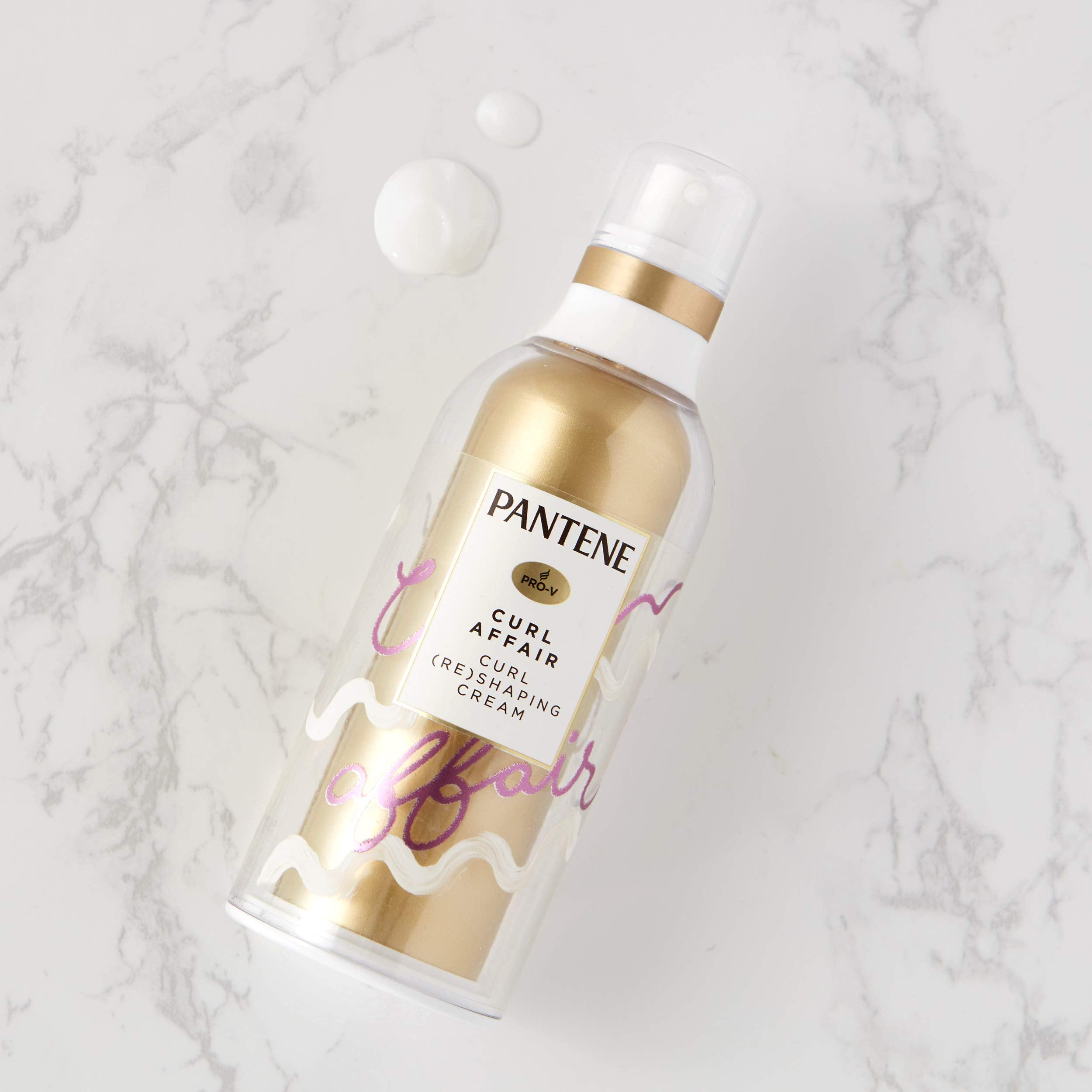 Pantene Curl Affair Shaping Cream applied to damp hair for soft definition