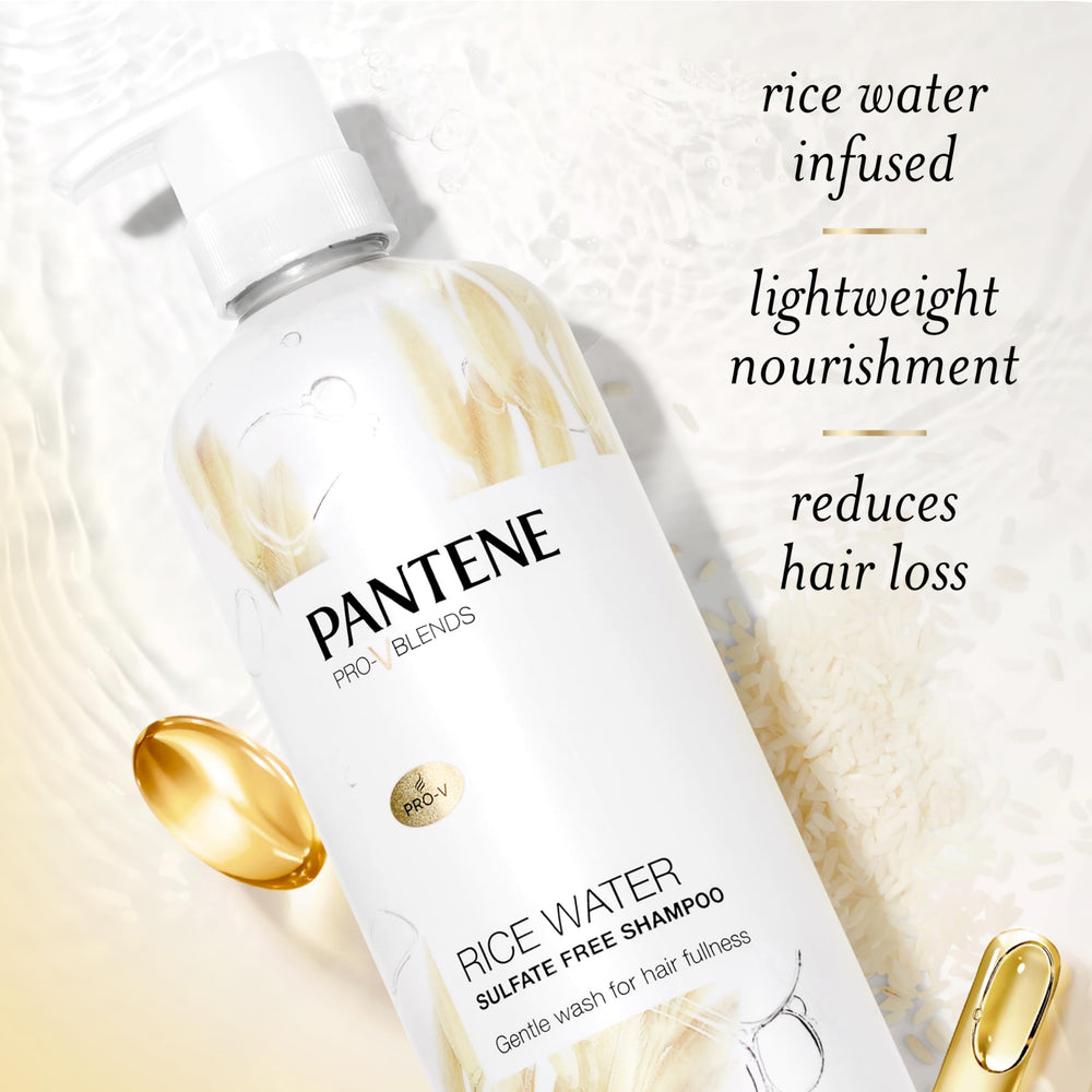 Pantene volume-boost shampoo in hand suggests fuller-looking hair after wash.