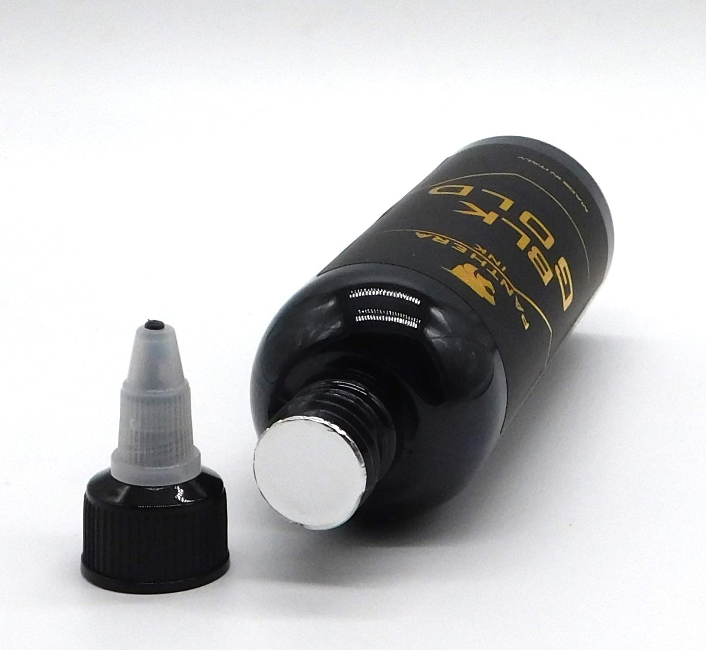 Panthera Black BLK Gold ink on skin demonstration showing rich color payoff.
