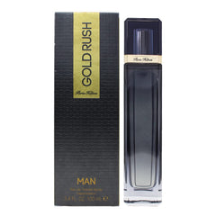 Paris Hilton Gold Rush Man spray dispensing image emphasizes easy application and confident scent.
