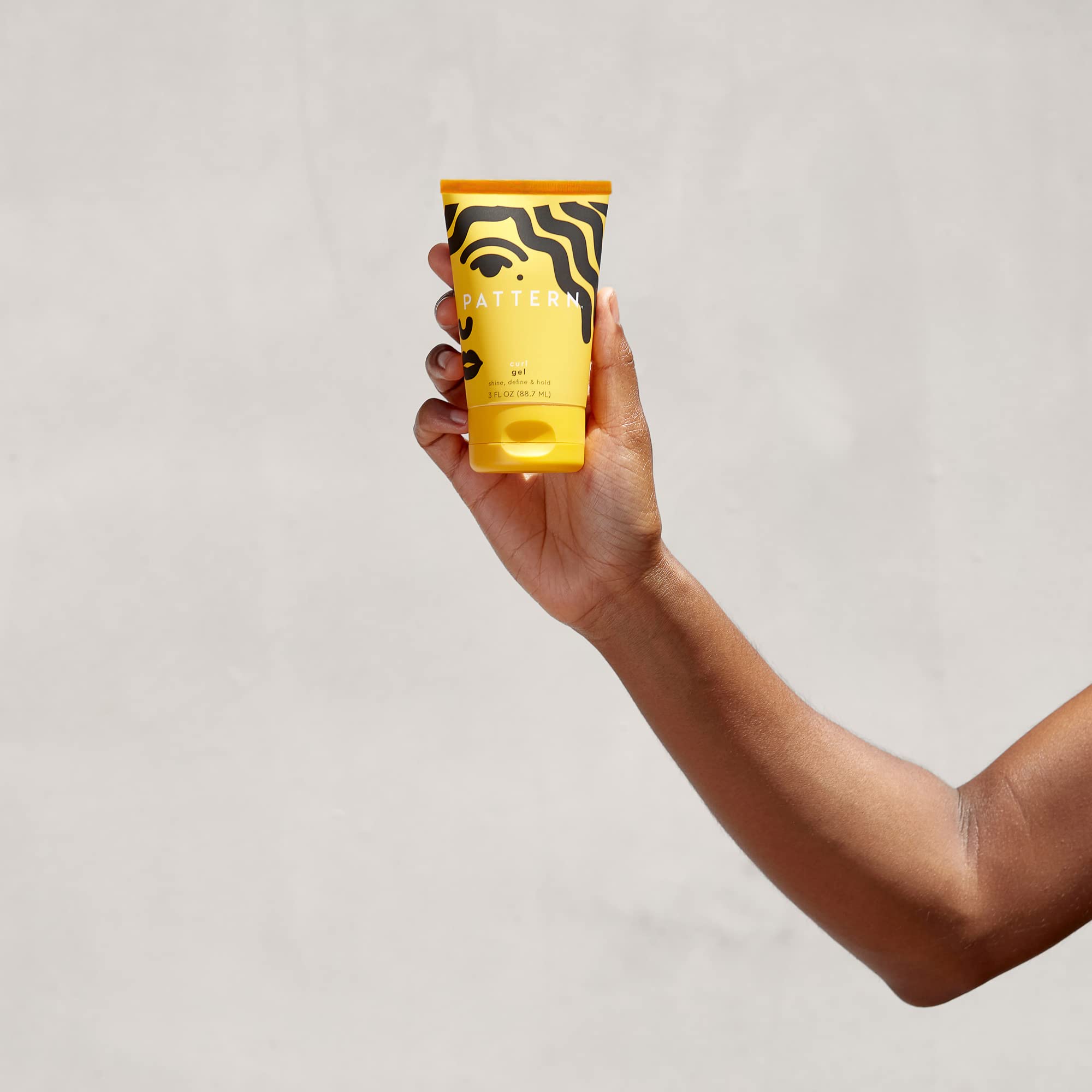 Pattern Beauty aloe vera oil droplets hydrate curls for smooth prep.