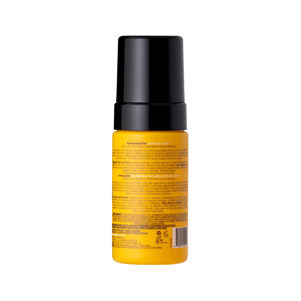 PATTERN Beauty mini curl mousse result shows smooth, voluminous curls with shine