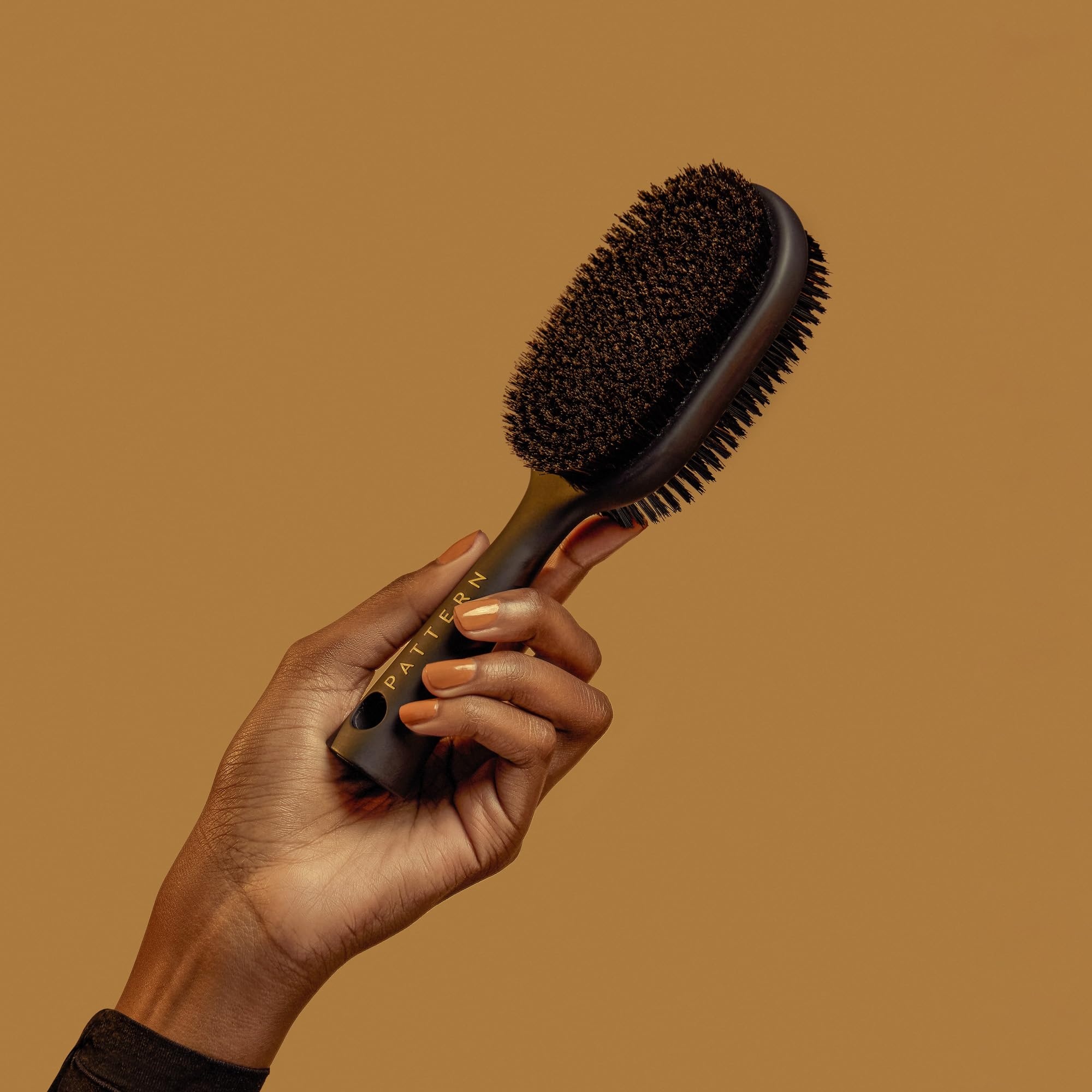 PATTERN Beauty compact size aids portable smoothing and on-the-go styling.