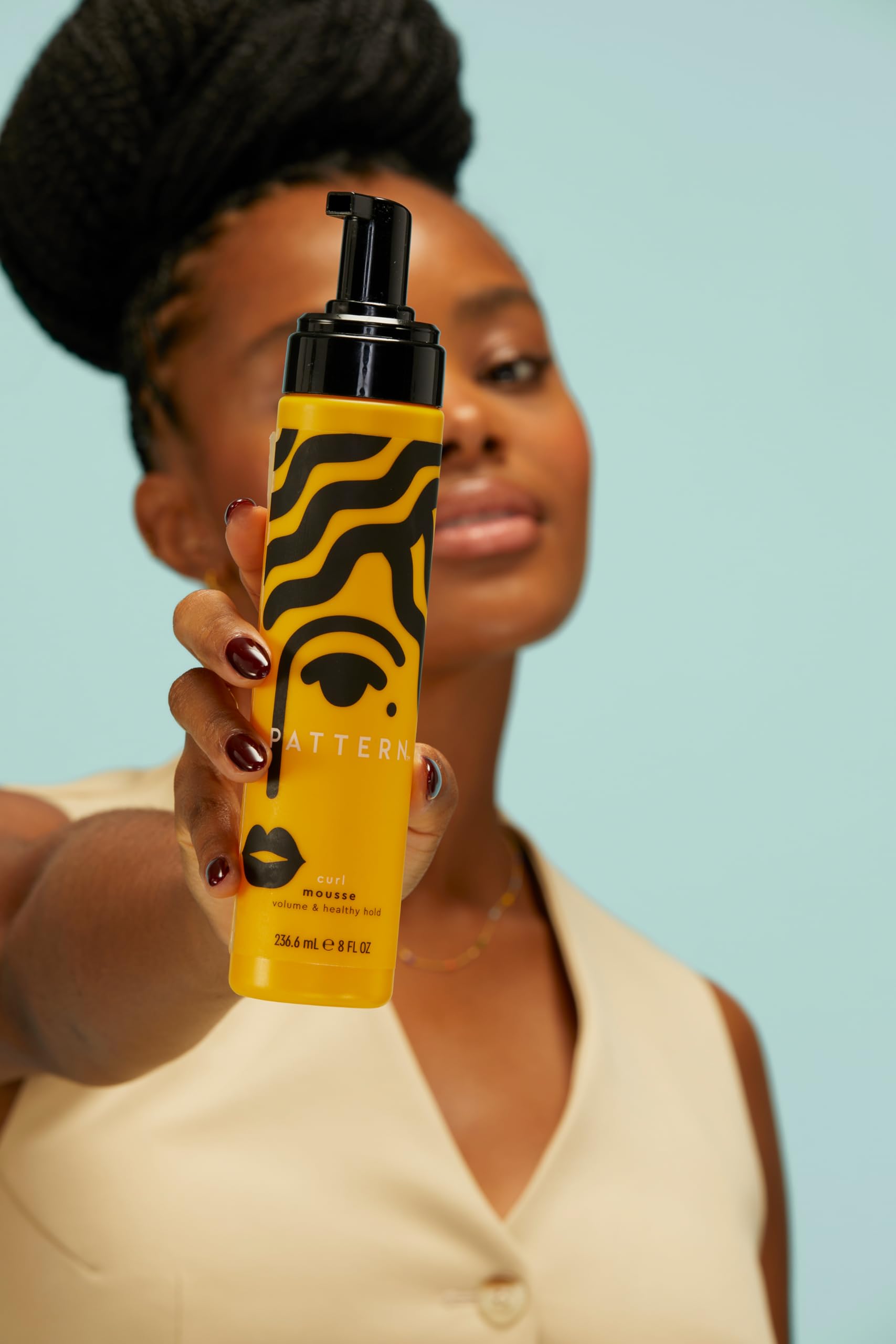 PATTERN Beauty Curl Mousse foam-dispense demonstrates weightless volume without crunch.