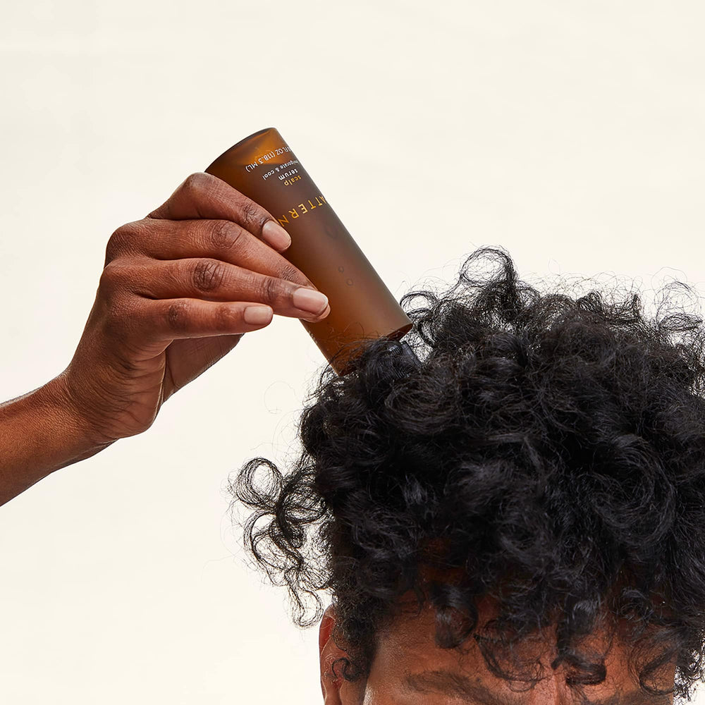 PATTERN Beauty rosemary-peppermint ingredients label highlights refreshing scalp care benefits.