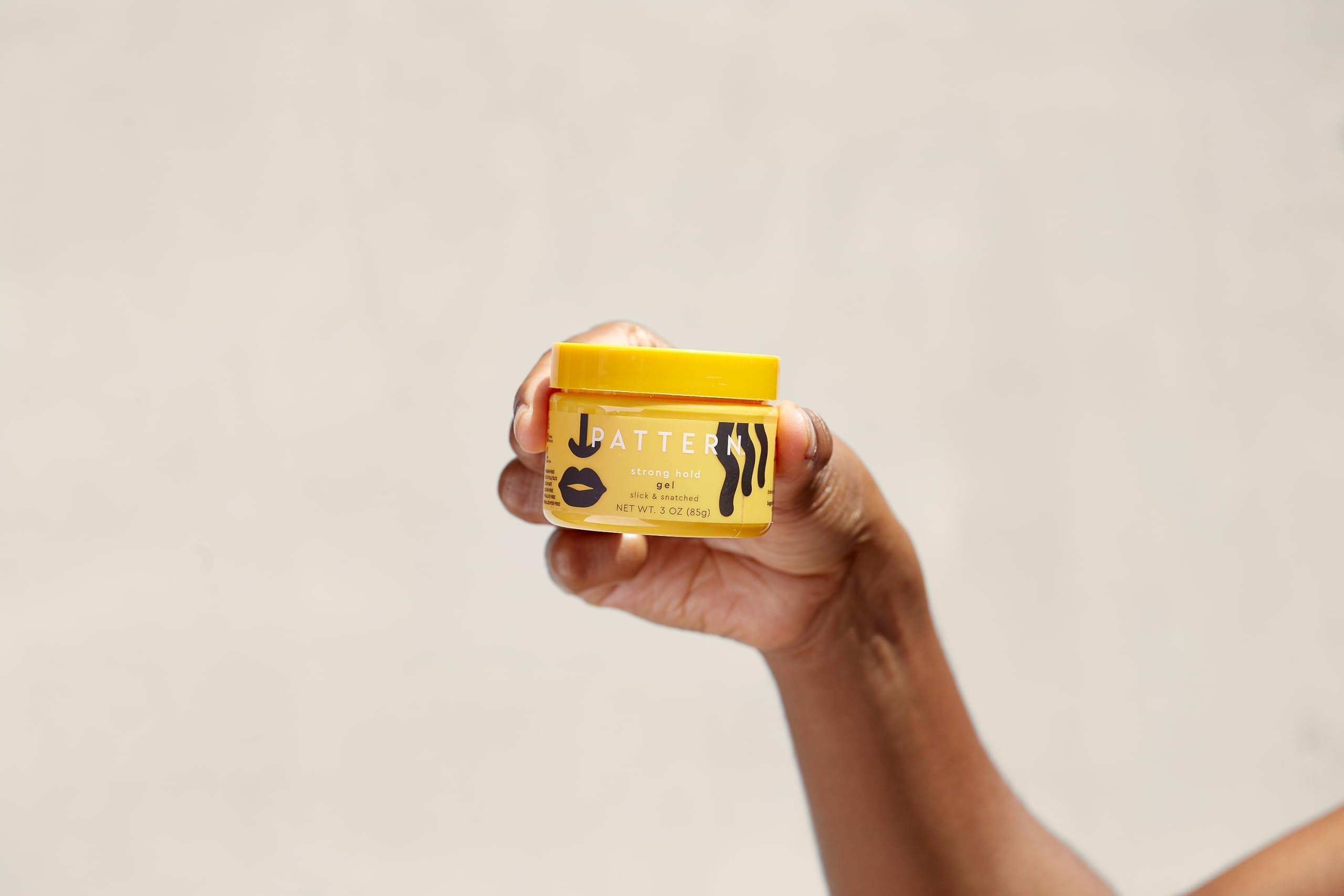 PATTERN Styling Cream jar adds slip and shaping for frizz control.