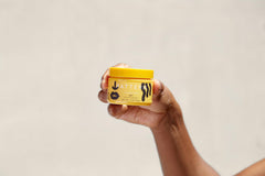 PATTERN Styling Cream jar adds slip and shaping for frizz control.