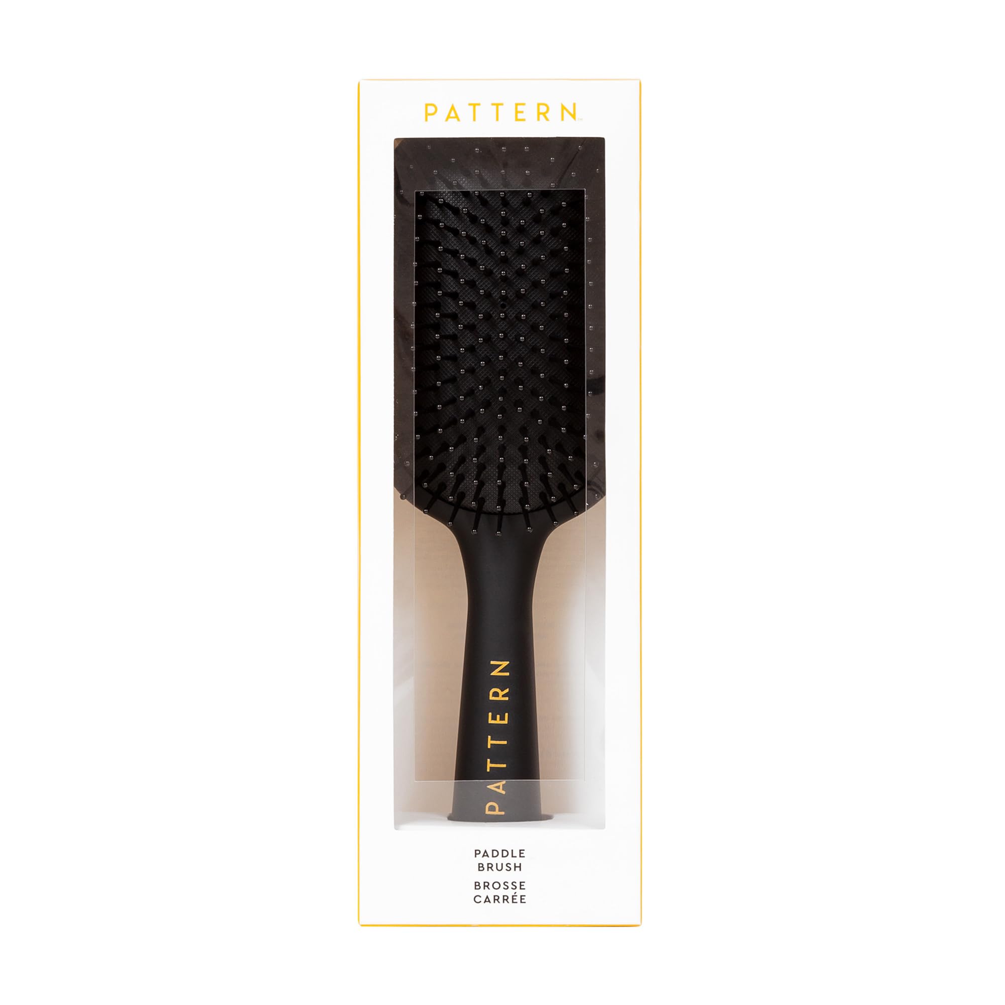 PATTERN Beauty paddle brush ergonomic matte handle improves grip during styling.