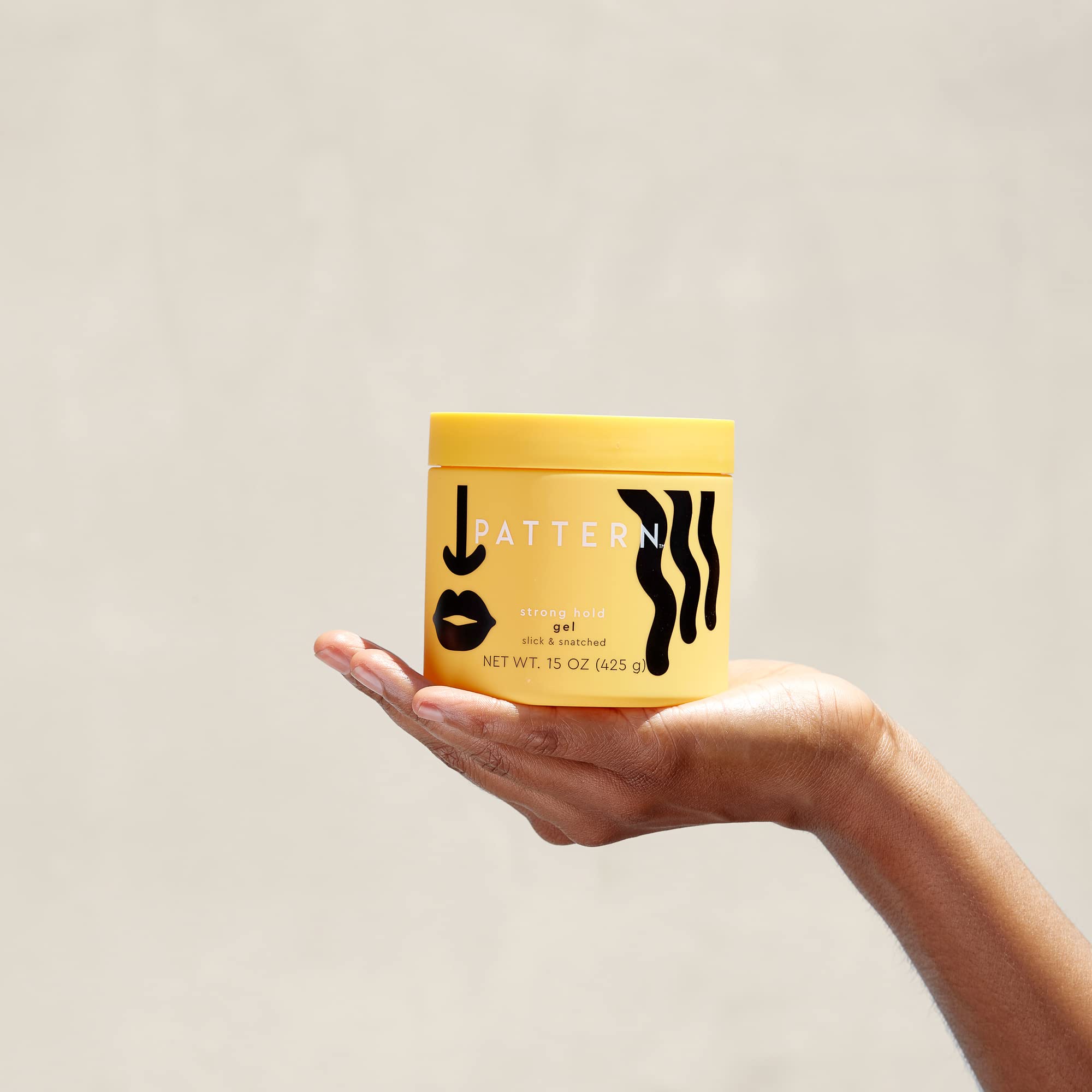 PATTERN Strong Hold fragrance shot suggests clean Neroli and Rose notes.