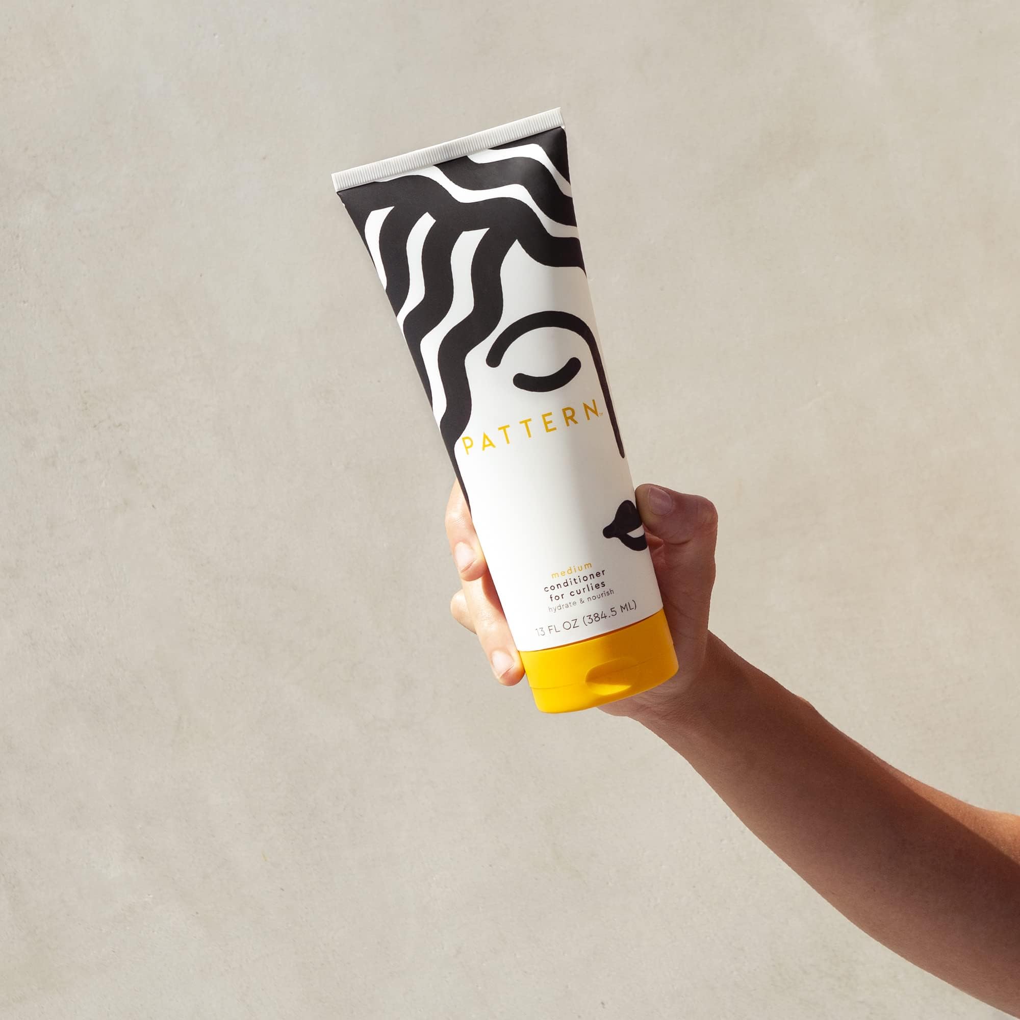 PATTERN Beauty by Tracee Ellis Ross Medium Conditioner hair swirl showing hydrated curls.