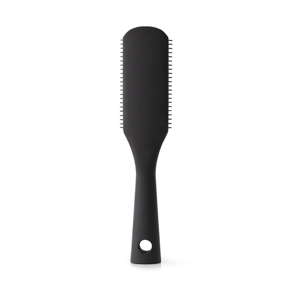 PATTERN Beauty Shower Brush bristles closeup emphasizes waterproof, flexible bristles for curly textures.