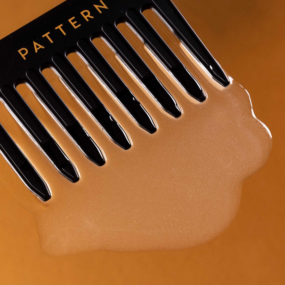 PATTERN Beauty Detangling Nectar on wet or dry hair for versatile use.