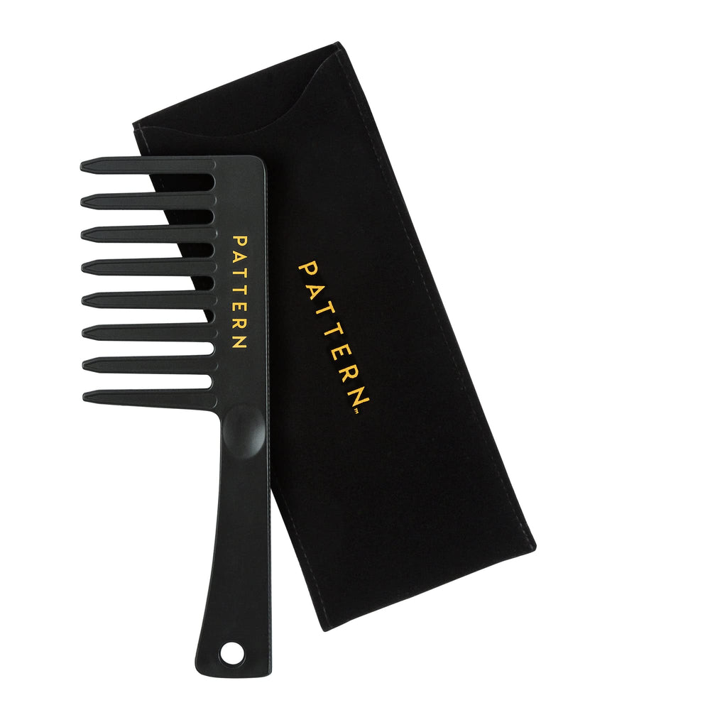 PATTERN Beauty wide-tooth comb in use on curls providing smooth detangling.