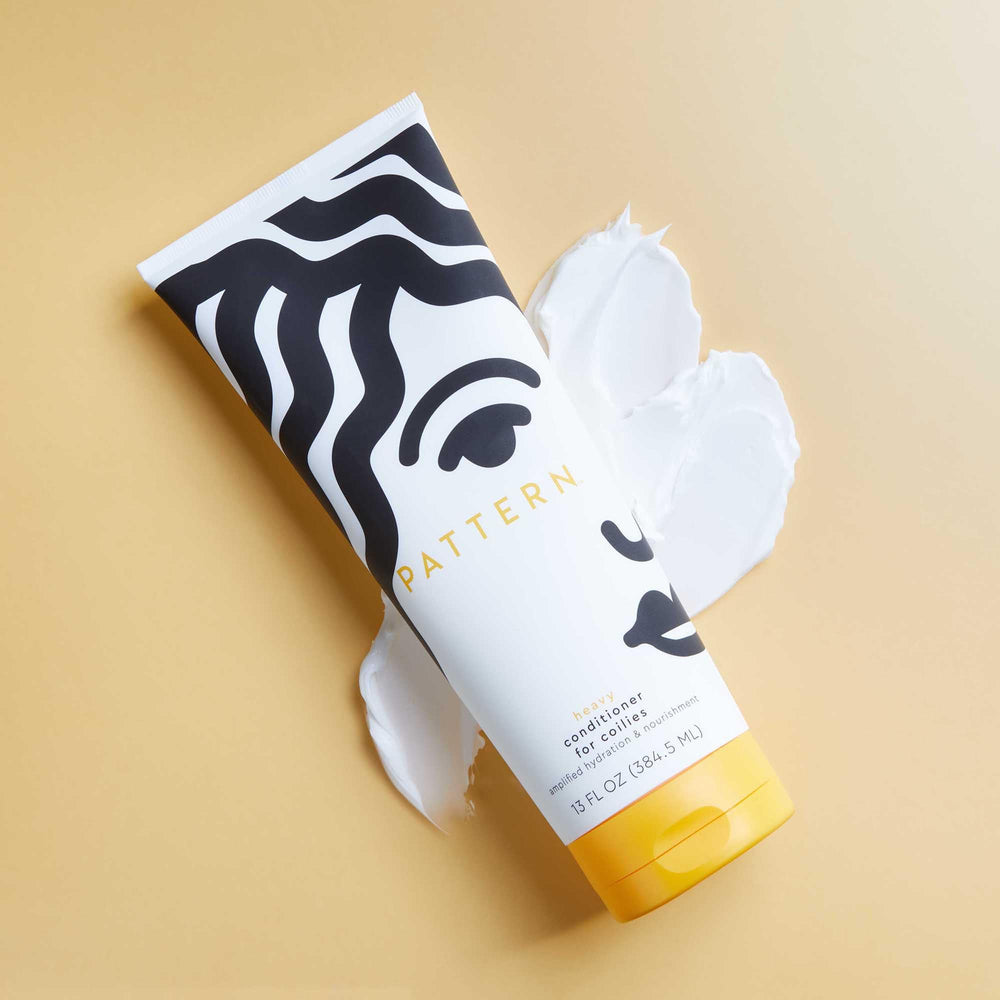 PATTERN Heavy Conditioner routine-application shot shows simple detangling and nourishing process for curls.