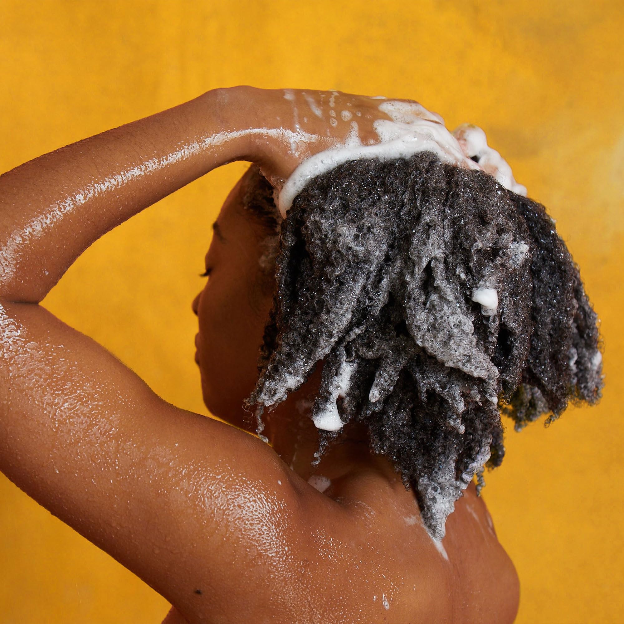 PATTERN Hydration Shampoo honey-amber tint evokes nourishing scalp moisture