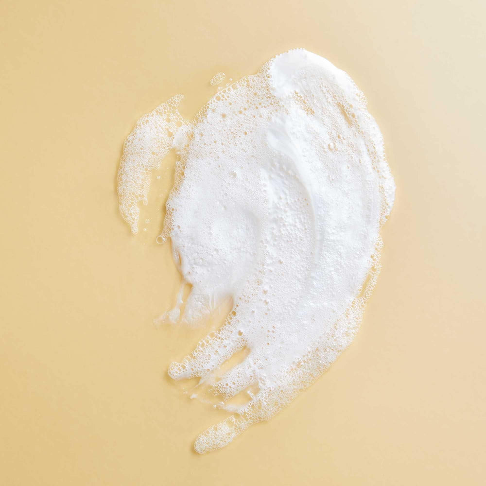 PATTERN Hydration Shampoo honey drops convey nourishing oils for curls.