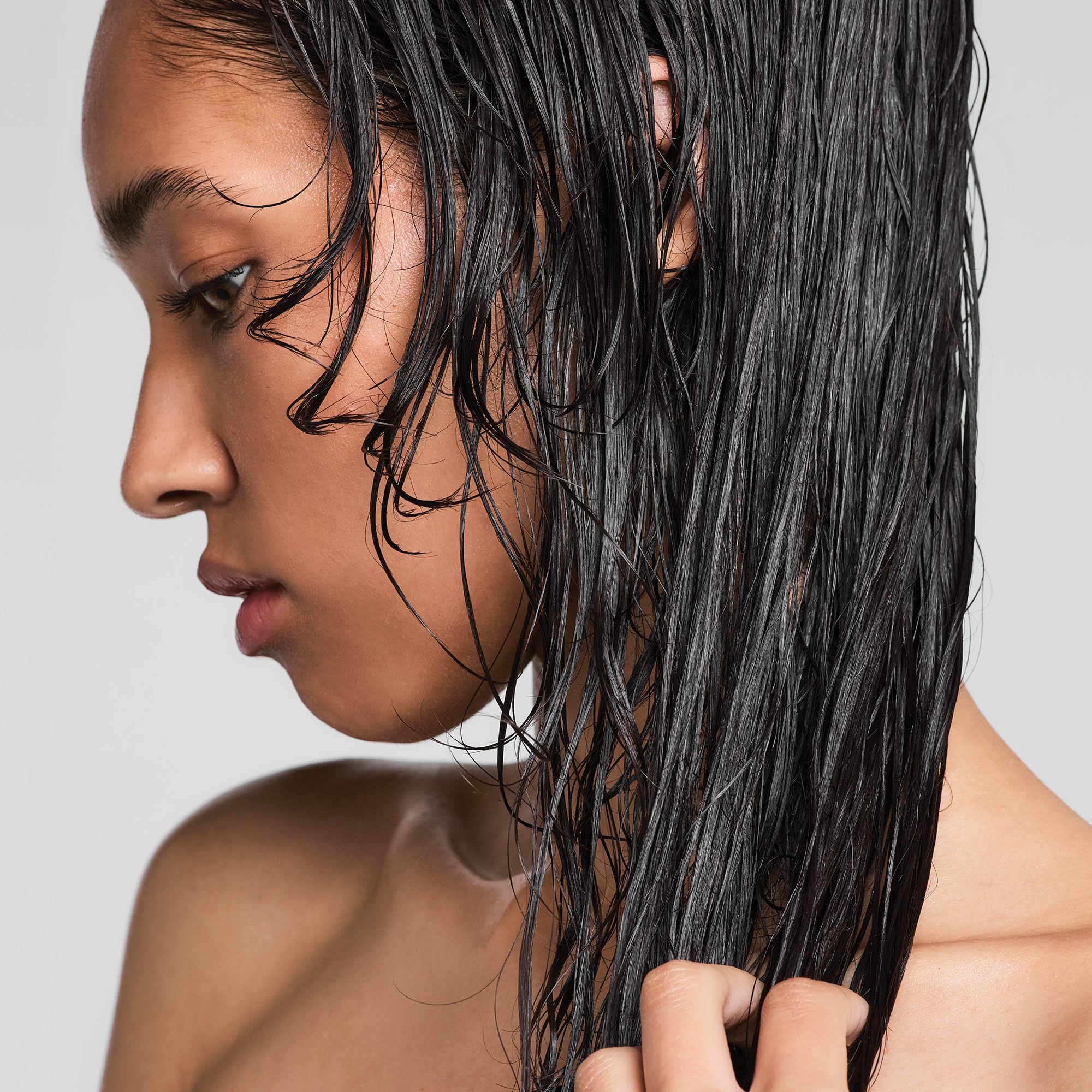 Paul Mitchell Clear Styling Glaze dispenser shot emphasizes fragrance-free formula for sensitive skin