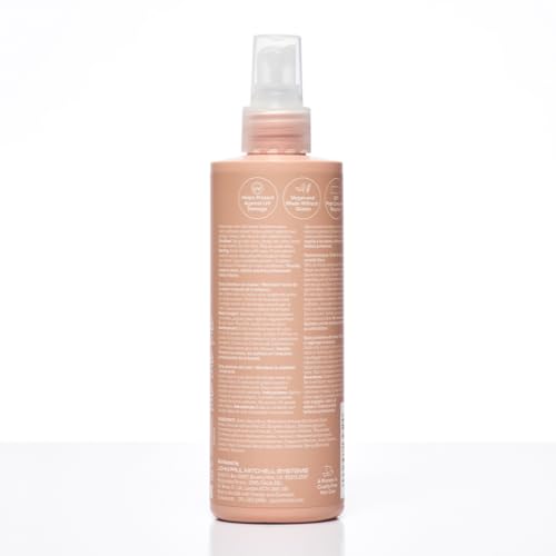 Paul Mitchell Color Protect Locking Spray being sprayed demonstrates even coverage and ease of use