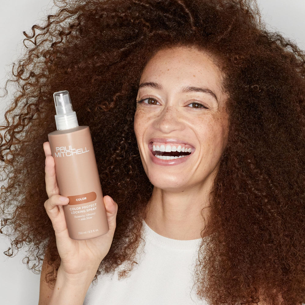Paul Mitchell Color Protect Locking Spray in sunlight hints at UV defense for color-treated hair