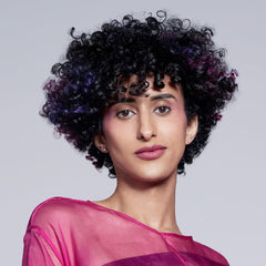 Paul Mitchell ESP Elastic Shaping Paste being applied to hair demonstrates bendable texture.
