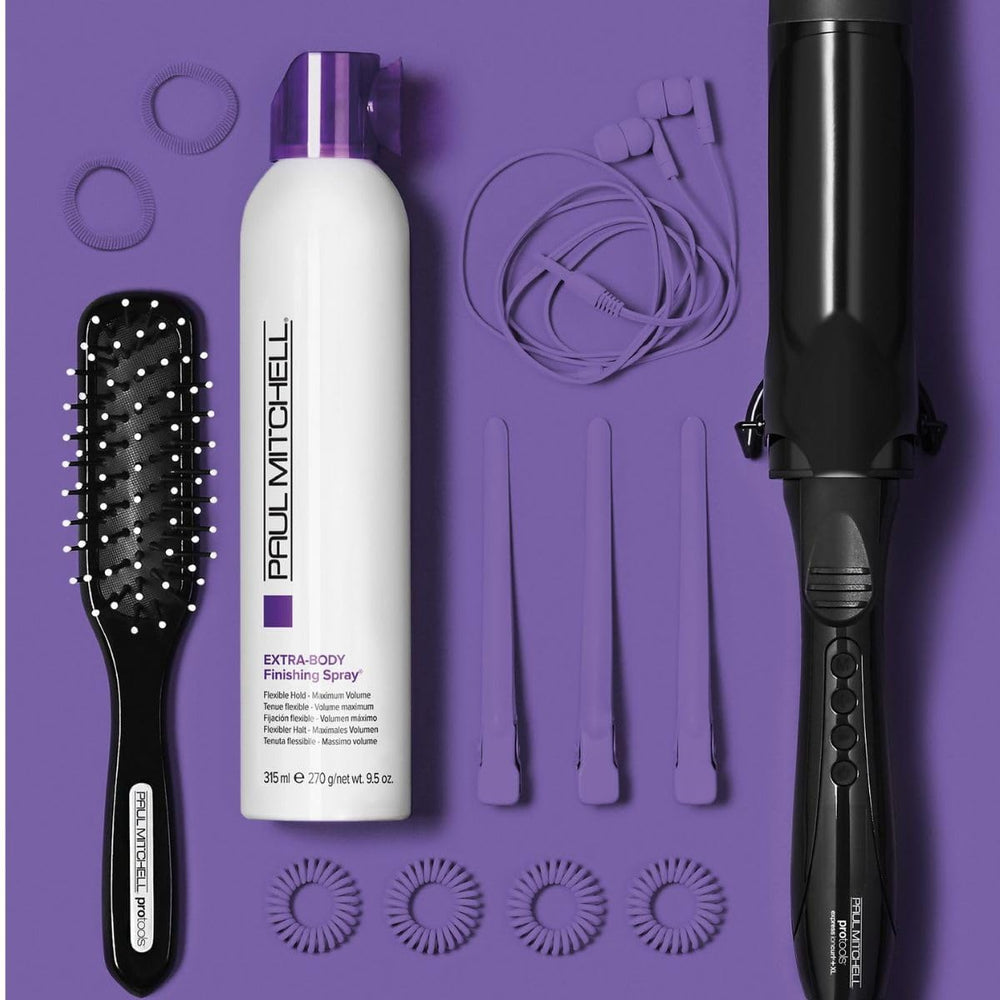 Paul Mitchell Extra-Body Finishing Spray applied to hair for lift and texture.