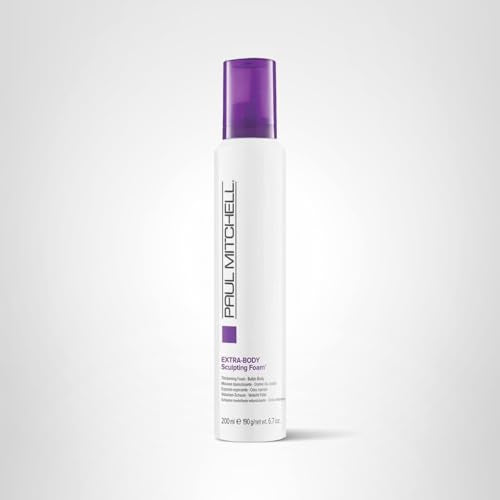 Close-up shot of bottle and mousse texture on hand
