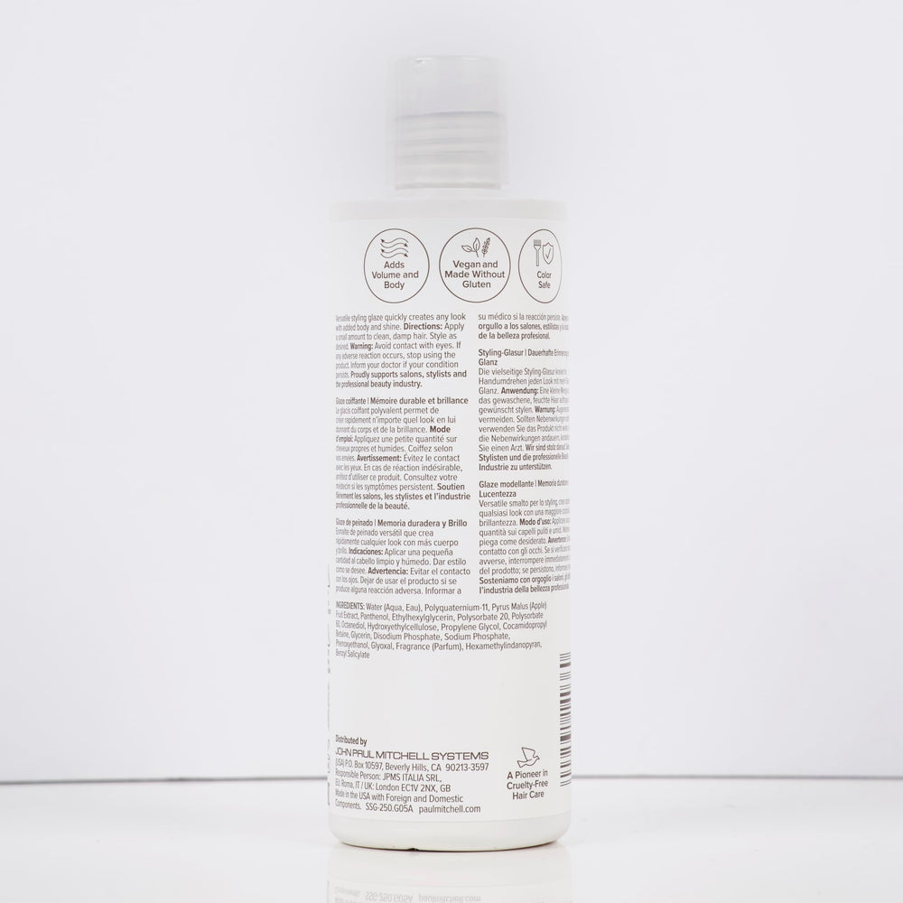 Paul Mitchell fast-dry styling glaze in action for quick results.