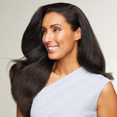 Paul Mitchell Freeze and Shine spray dispersion reveals even mist for strong hold.