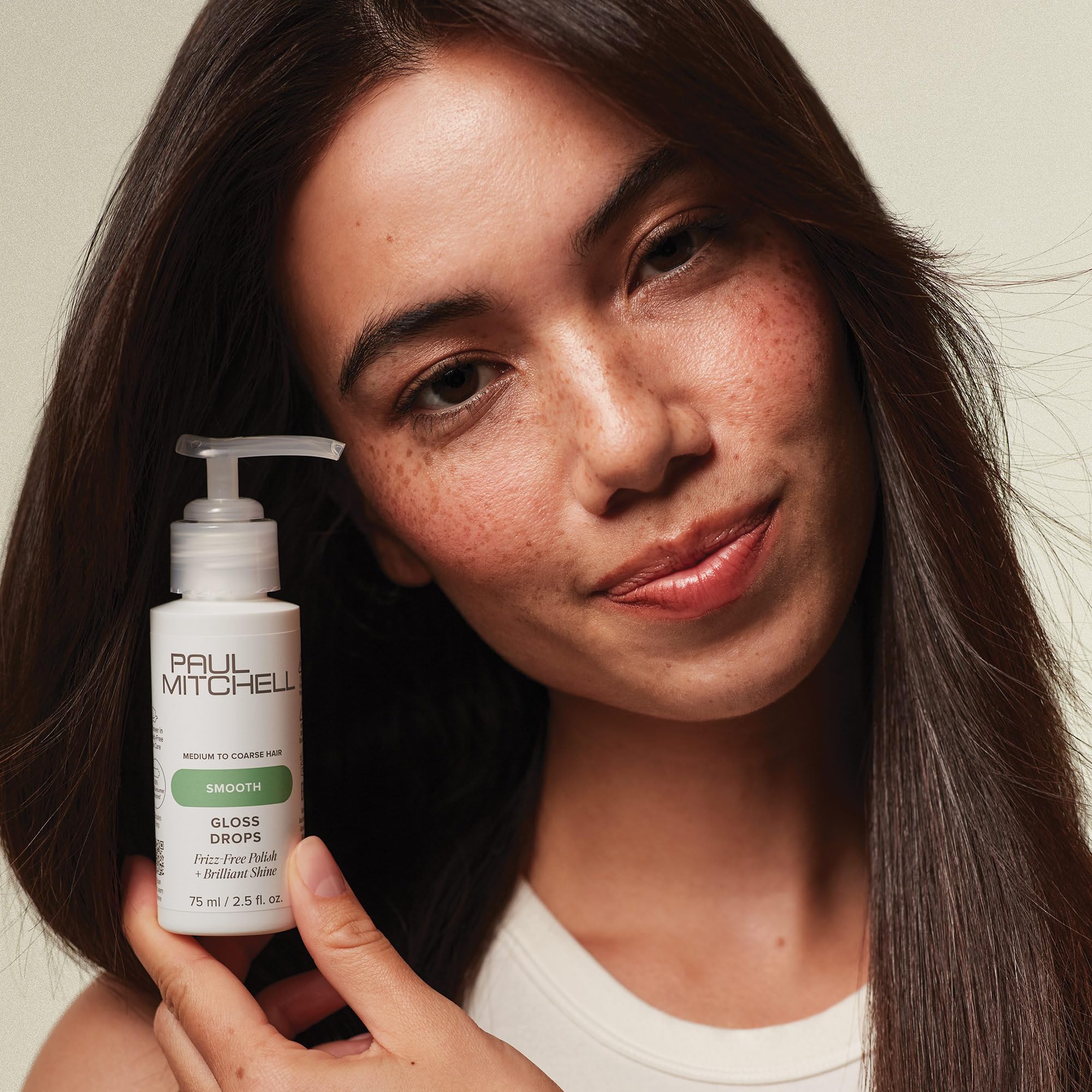 Paul Mitchell Gloss Drops citrus-floral fragrance adds a subtle, fresh scent.