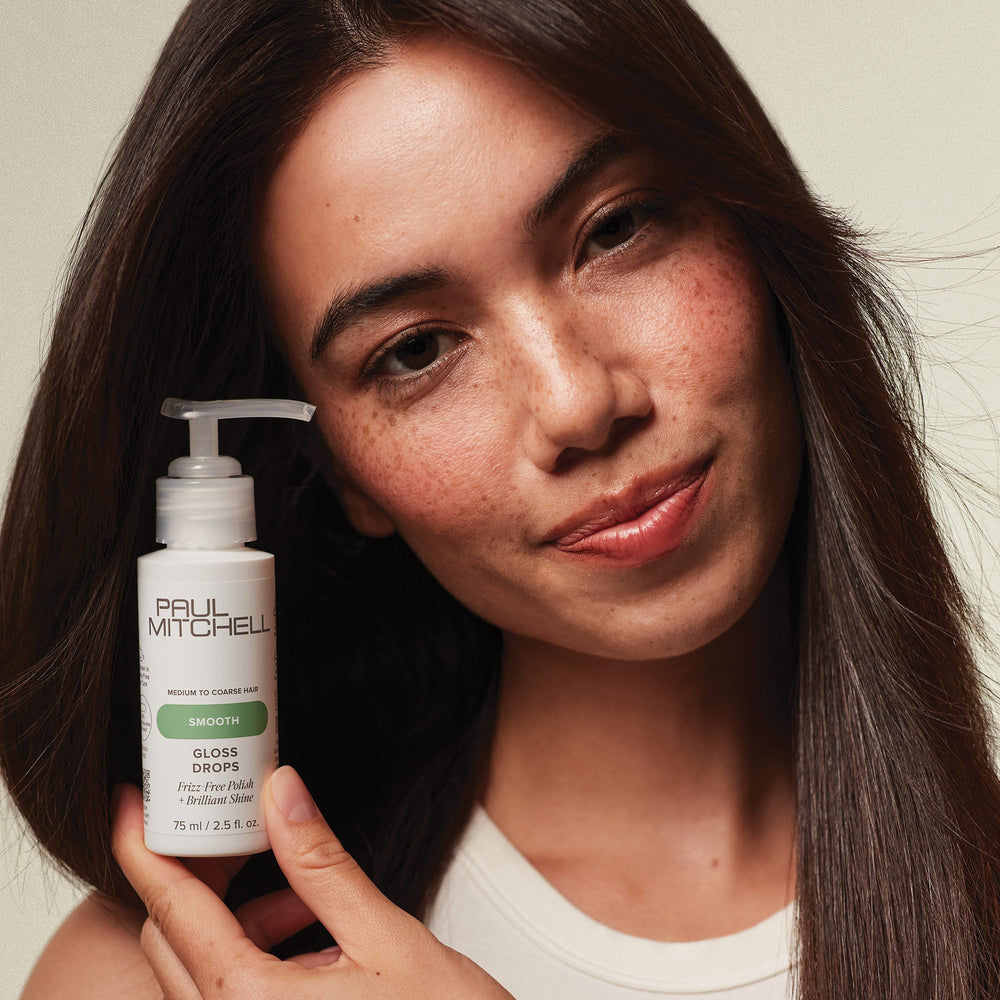 Paul Mitchell Gloss Drops citrus-floral fragrance adds a subtle, fresh scent.