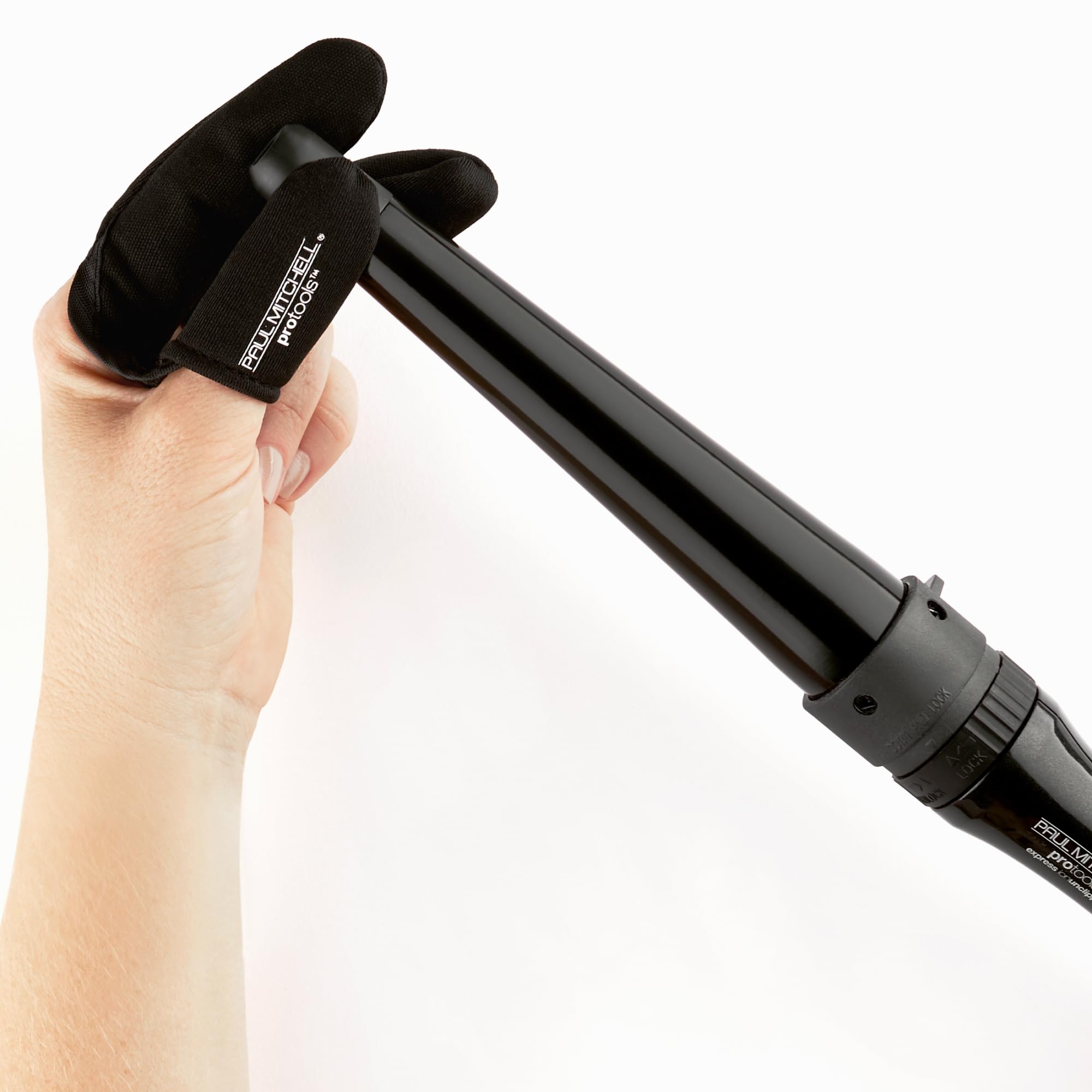 Paul Mitchell wand in use during a styling session for smooth, shiny results.