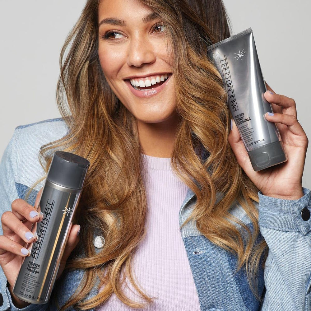 KerActive protein label on Paul Mitchell Forever Blonde packaging signals elasticity support.
