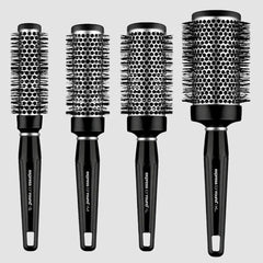 Paul Mitchell Express Ion aluminum round brush large barrel close-up showing vented design for shaping.