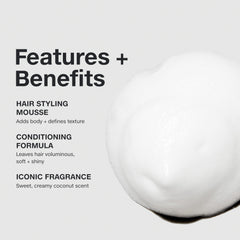Hands applying Paul Mitchell Sculpting Foam for even distribution