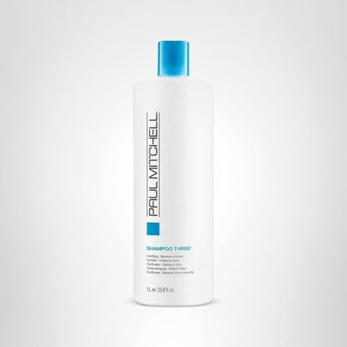 Paul Mitchell Shampoo Three fragrance label; vivid pink grapefruit scent noted.