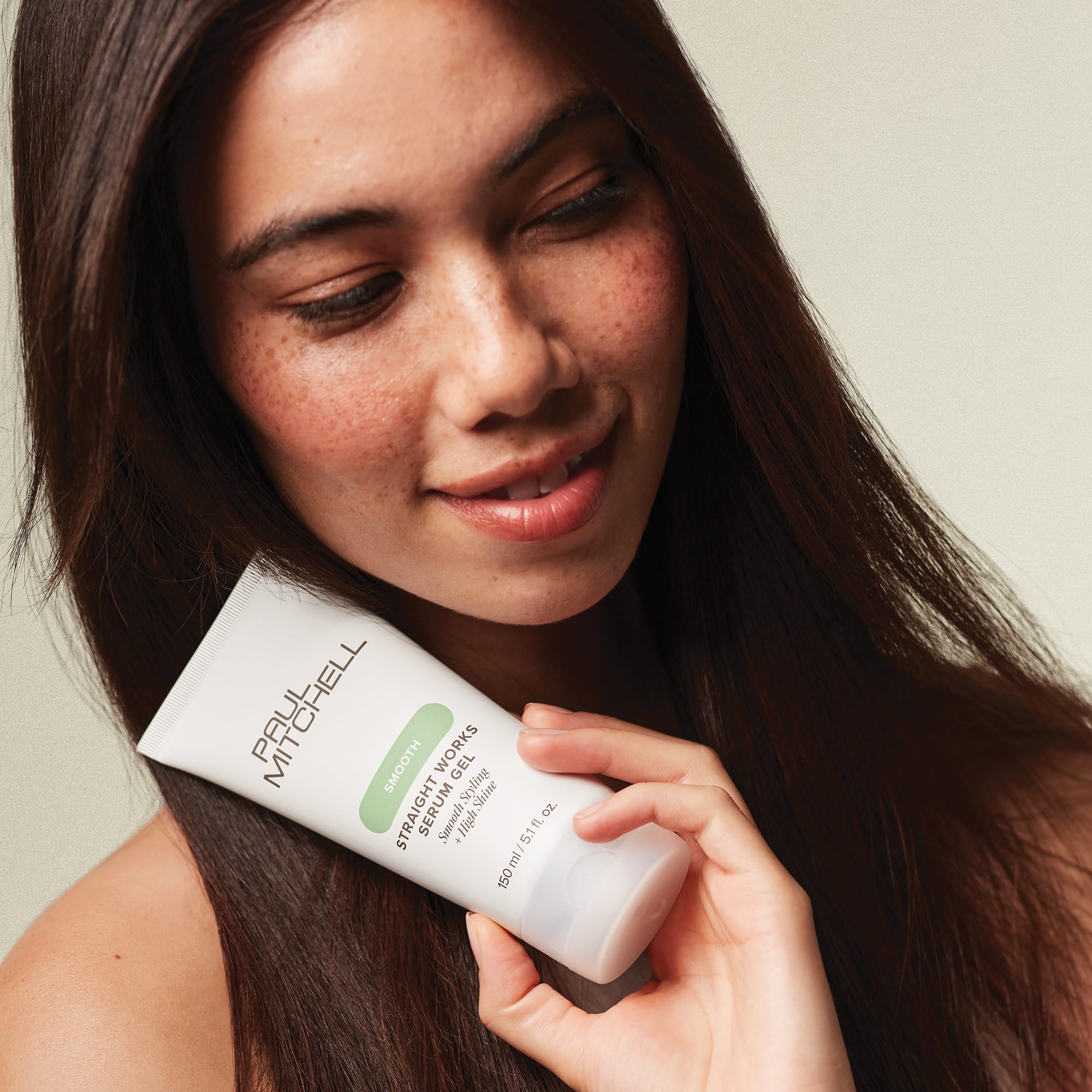 Paul Mitchell Straight Works Serum Gel texture application demonstrates smooth slip for styling.
