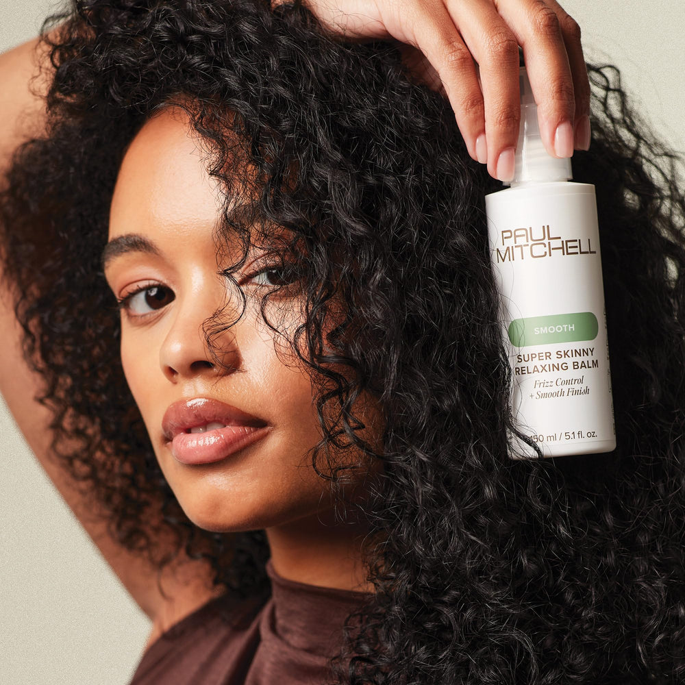 Paul Mitchell Super Skinny Relaxing Balm hair shine on defined curls.